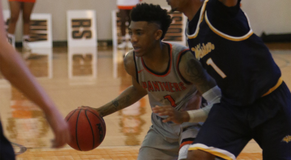 Men's basketball hangs on for 125-119 win at Spalding