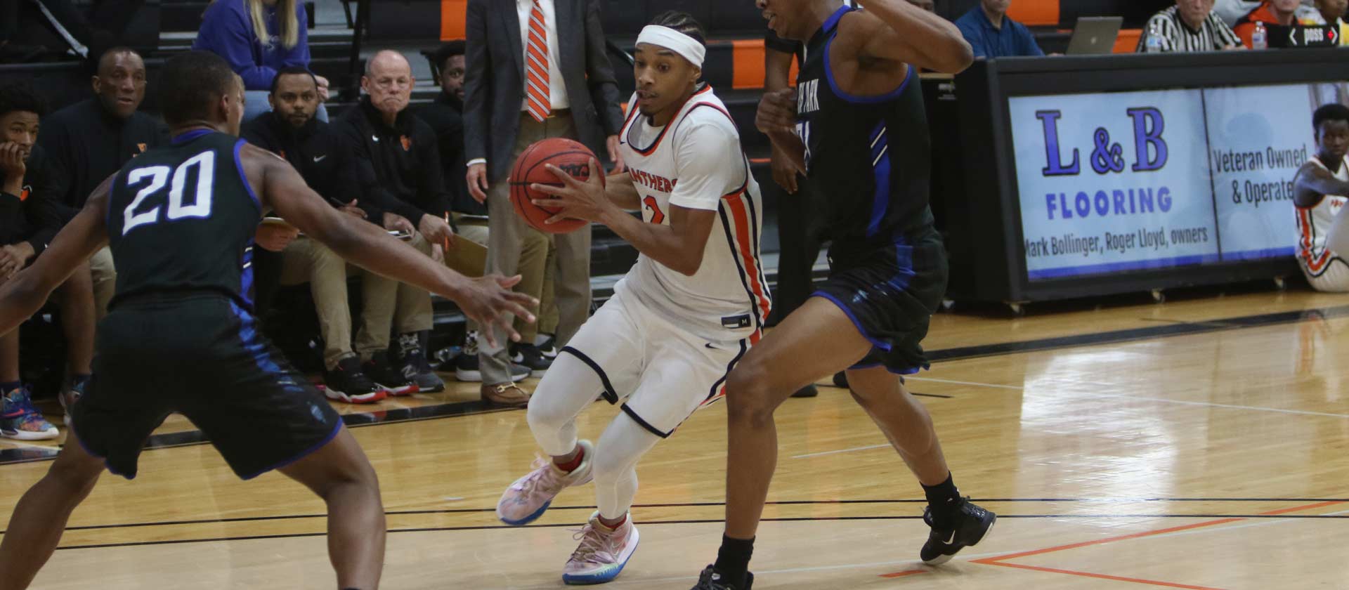 Men's basketball topped 138-125 by Carthage