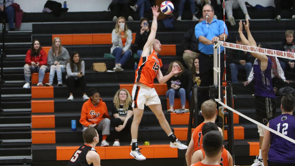 Men's volleyball attack led by Black in Friday split