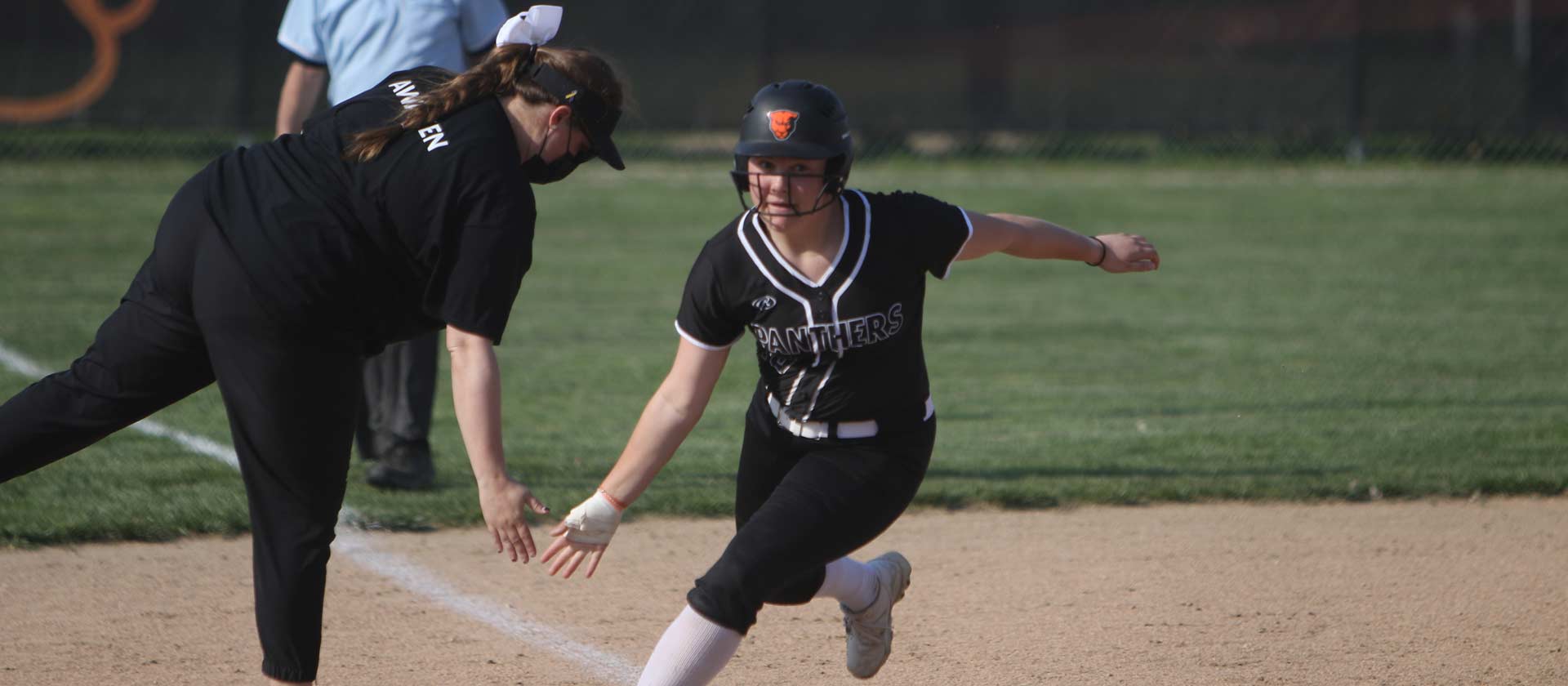 Softball takes one of two over Webster